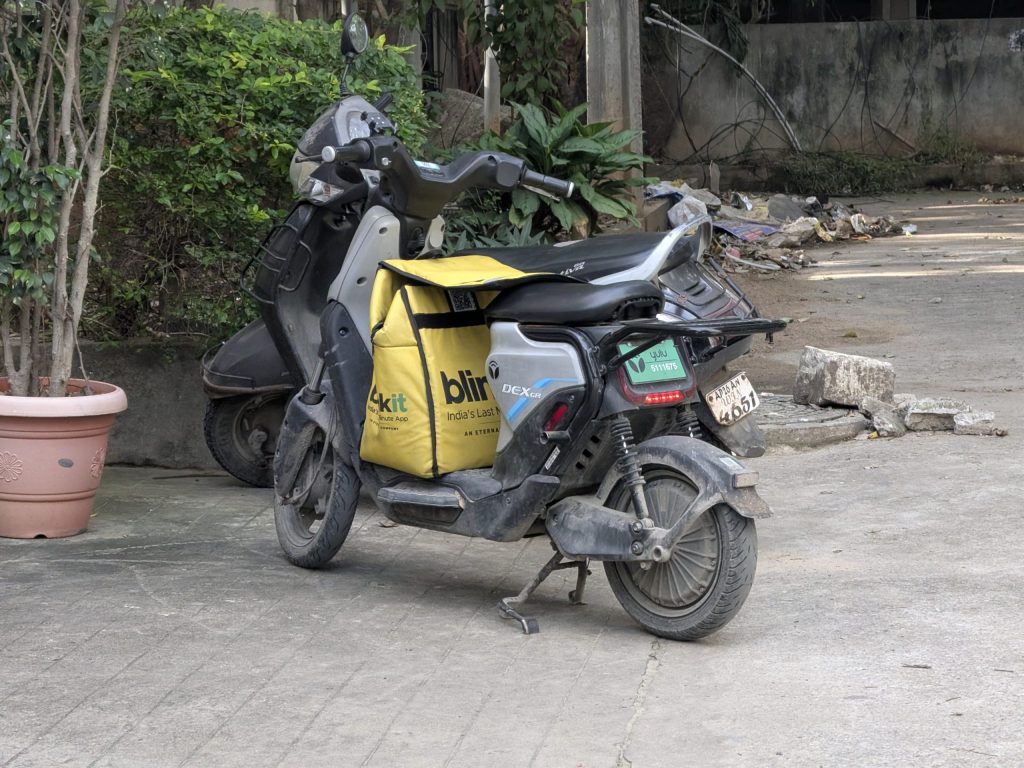 A Blinkit delivery bike in Hitech City, Hyderabad