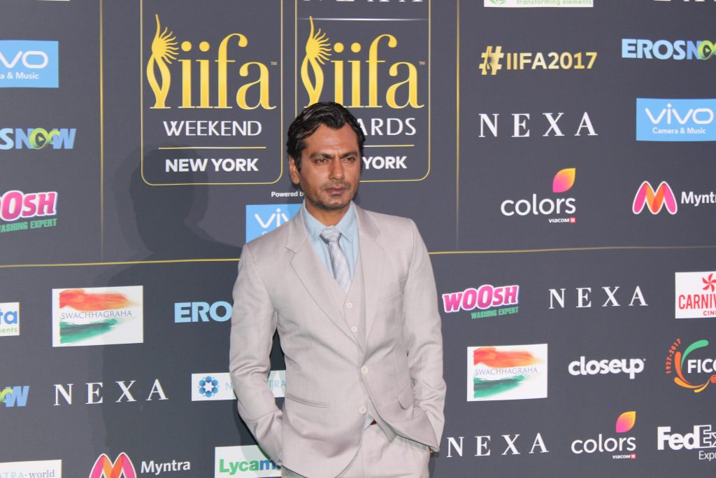 Nawazuddin Siddiqui in a grey suit on the IIFA 2017 green carpet in New York