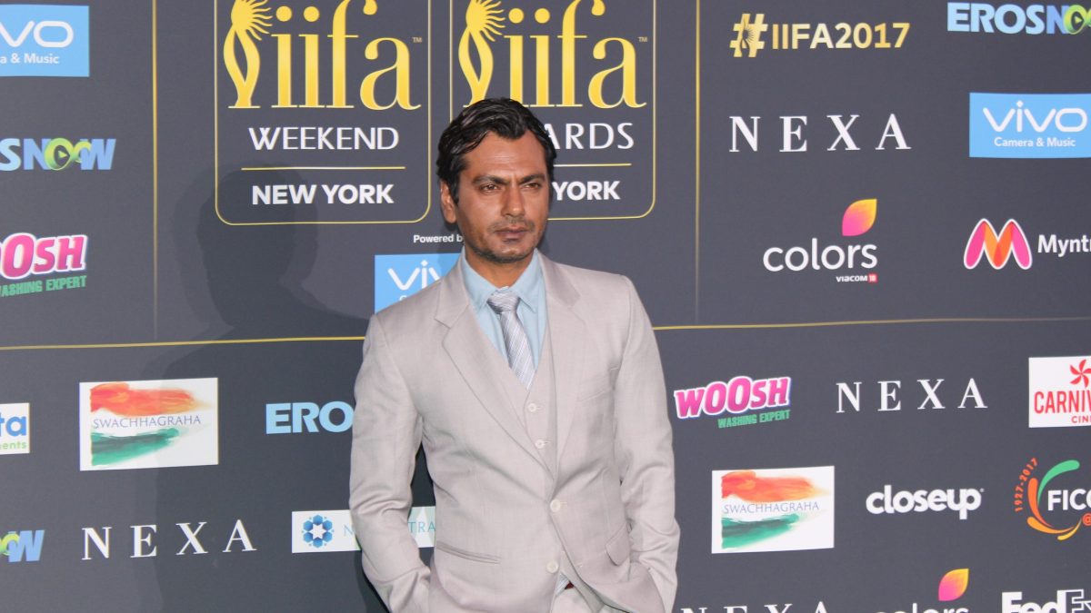 Nawazuddin Siddiqui in a grey suit on the IIFA 2017 green carpet in New York