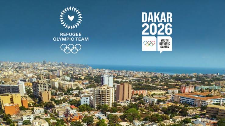 Dakar 2026 Youth Olympic Games and Refugee Olympic Team logos above an aerial view of the city of Dakar