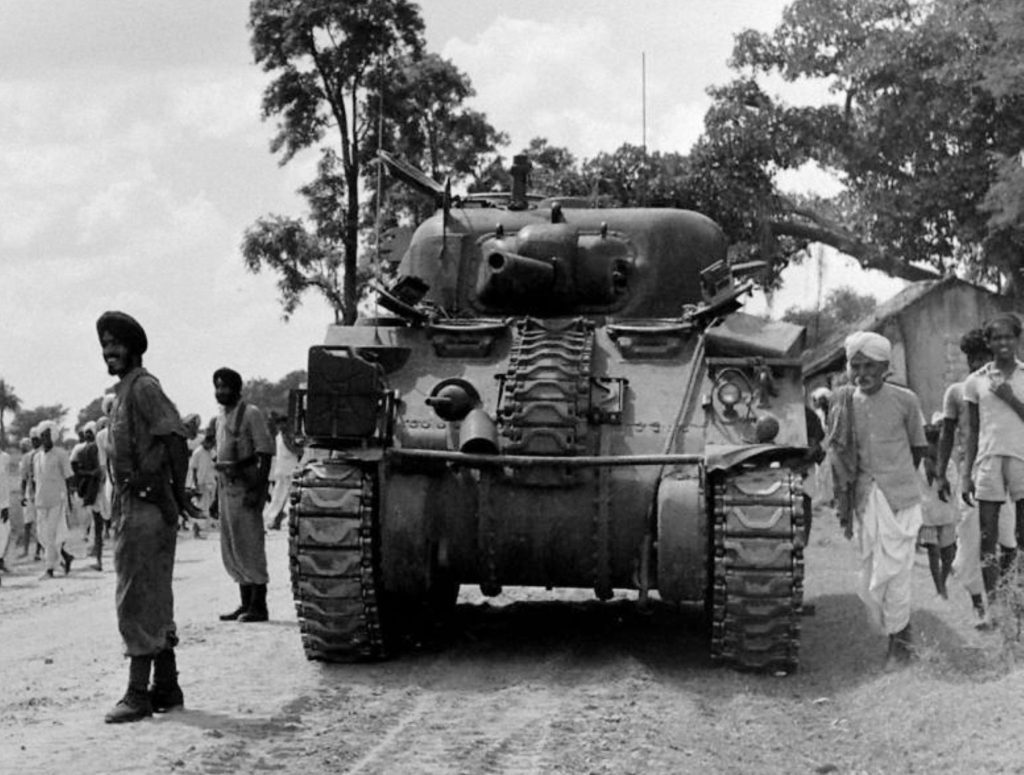 An Indian Army tank and soldiers in Hyderabad state, 1948
