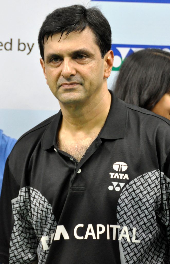 Prakash Padukone in a blazer at a badminton tournament