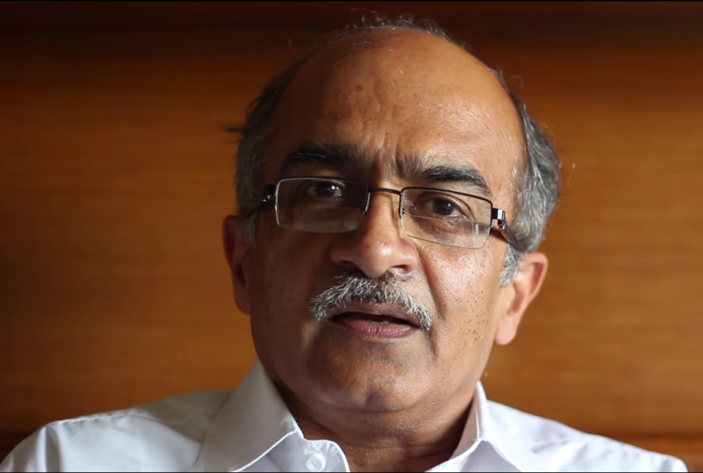 Close-up of Prashant Bhushan in rimless glasses and a white shirt