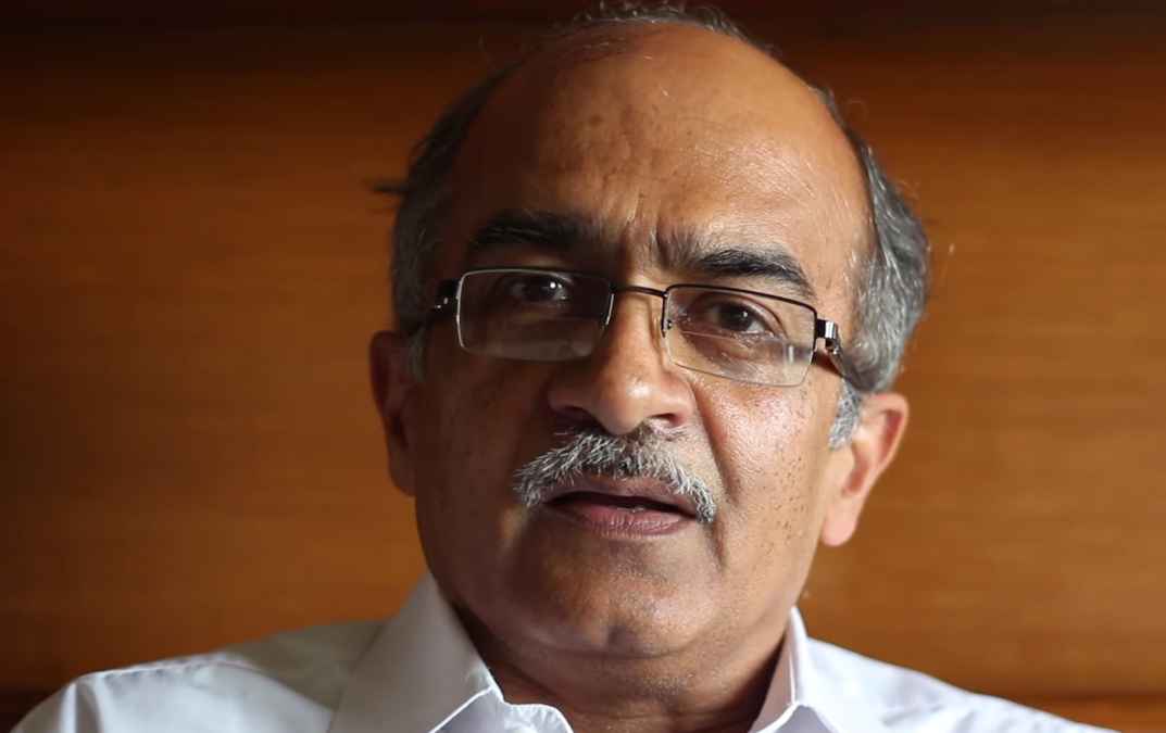 Close-up of Prashant Bhushan in rimless glasses and a white shirt