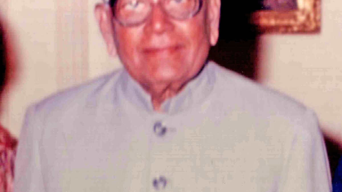 R. Venkataraman in glasses and a light bandhgala jacket