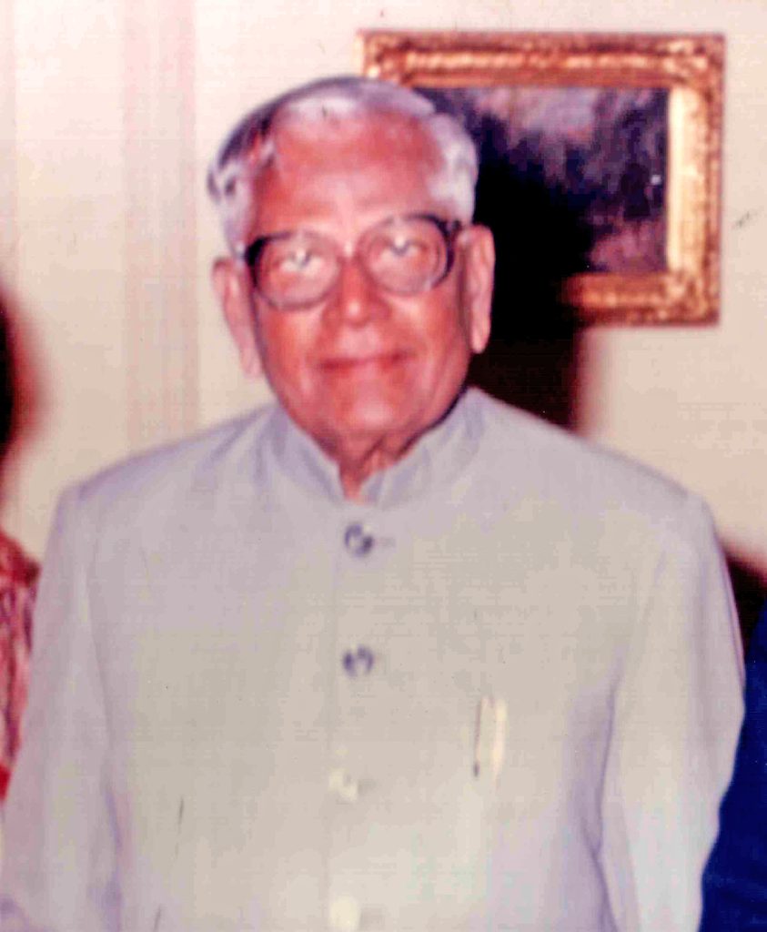 R. Venkataraman in glasses and a light bandhgala jacket