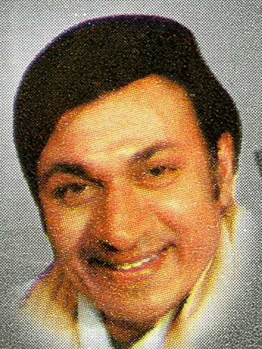 A portrait of Dr. Rajkumar smiling