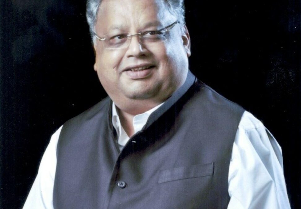 A portrait of Rakesh Jhunjhunwala in a white shirt