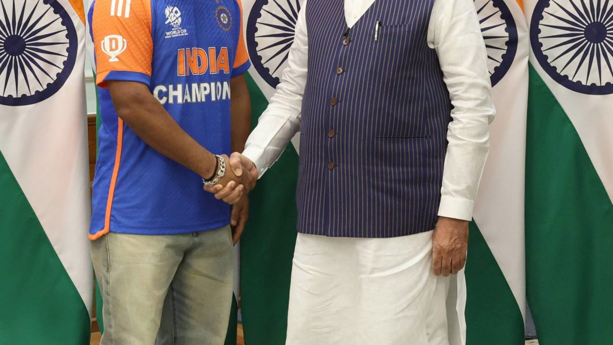Rishabh Pant in India's champions jersey with Prime Minister Narendra Modi