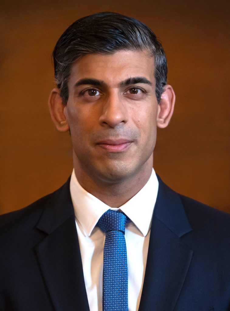 Official portrait of Rishi Sunak in a dark suit and tie
