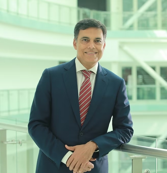 Portrait of Sajjan Jindal in a dark suit