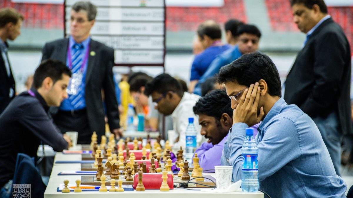 Indian chess players seated at their boards during a Chess Olympiad