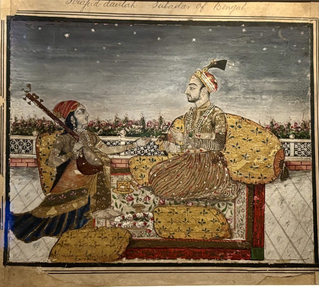 Miniature painting of Siraj-ud-Daulah seated on a terrace against cushions, listening to a musician
