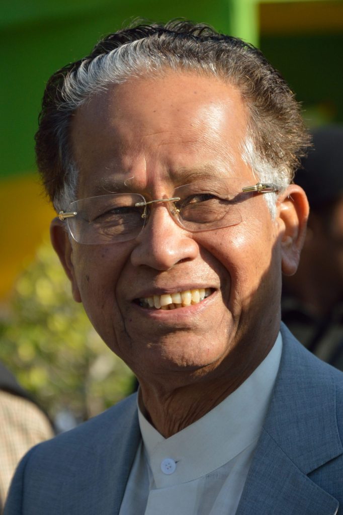 Tarun Gogoi in glasses and a dark jacket, smiling