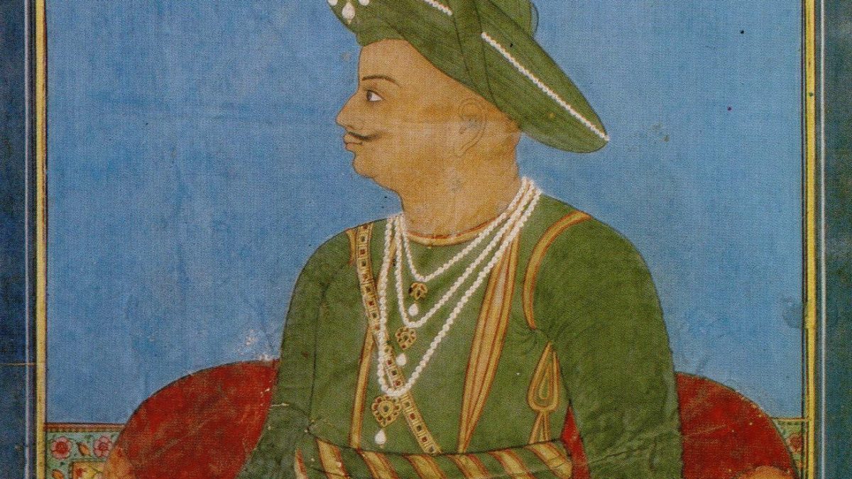 A painted portrait of Tipu Sultan in a green turban and striped coat
