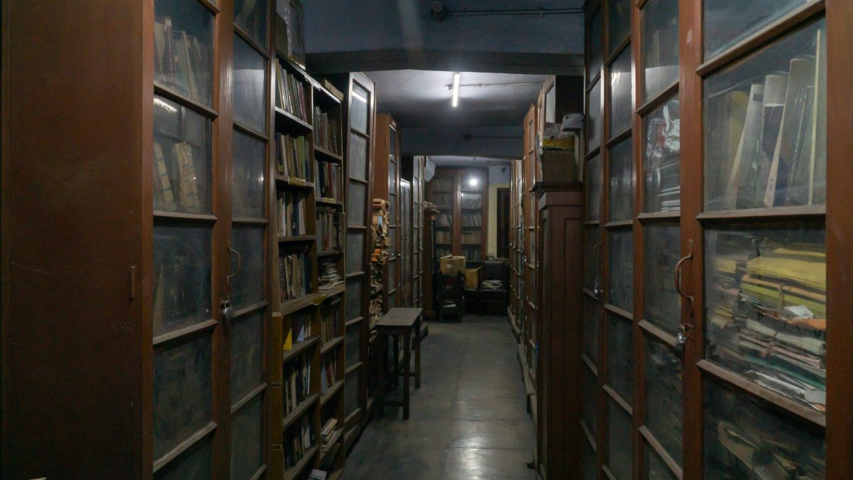 Shelves of books in a library reading room