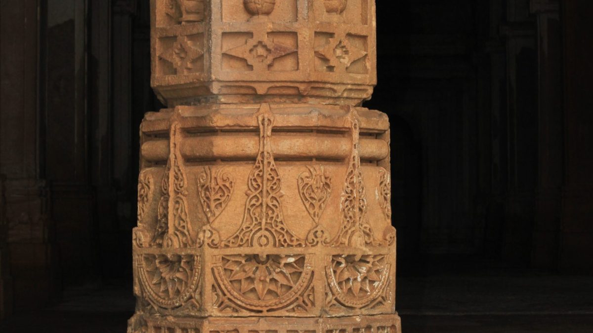 Close view of the carved stone base of a minaret of the Jami Masjid at Champaner in Gujarat