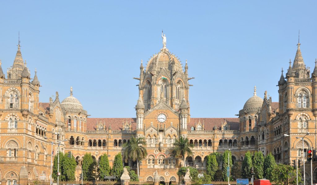 The ornate Victorian Gothic facade and central dome of Chhatrapati Shivaji Maharaj Terminus in Mumbai
