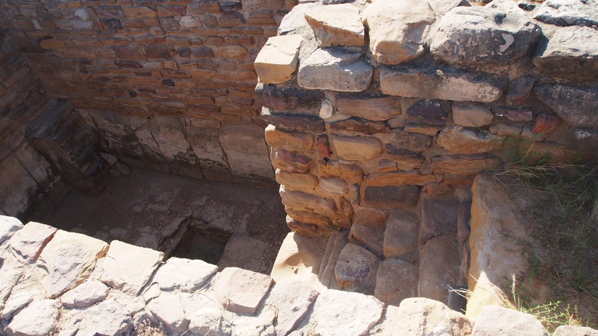 Stone-lined water storage tanks cut into the ground at the citadel of the Harappan city of Dholavira