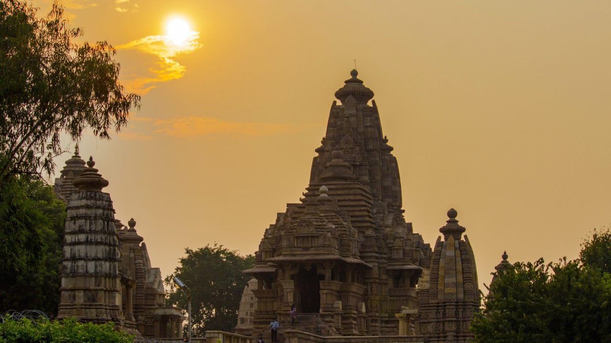 The tall sandstone spire and carved walls of the Kandariya Mahadeva Temple at Khajuraho