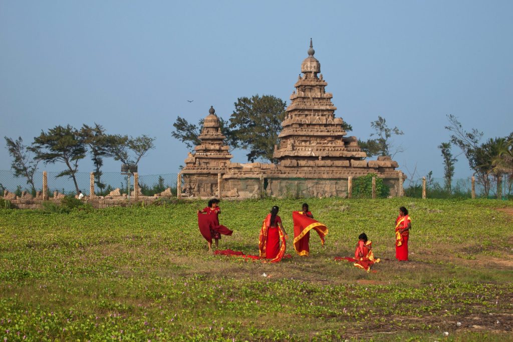 The stone towers of the Shore Temple at Mahabalipuram against the sky