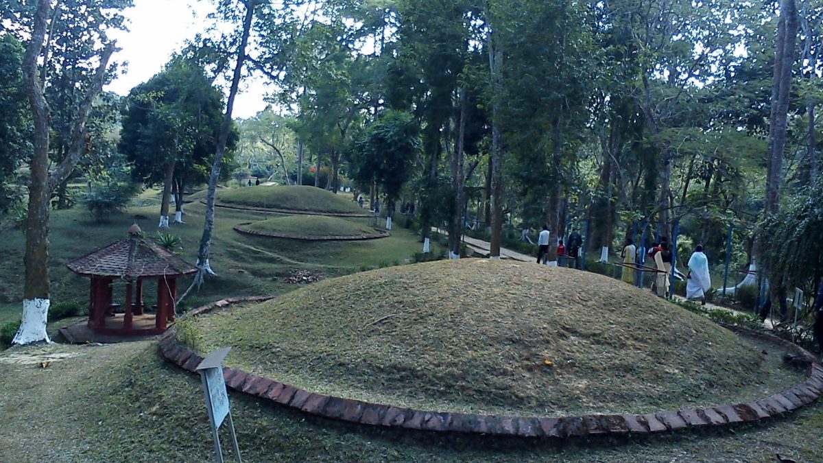 Grass-covered hemispherical burial mounds of the Ahom kings at Charaideo in Assam