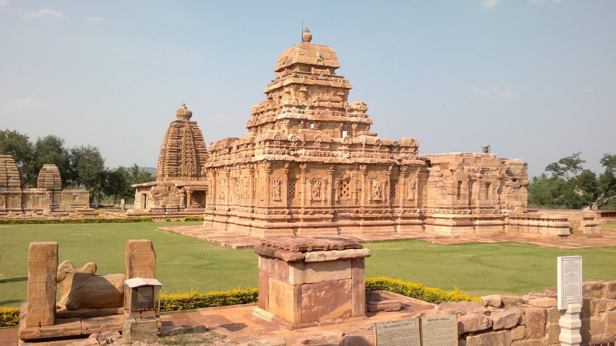 A sandstone temple with a stepped tower at Pattadakal in Karnataka