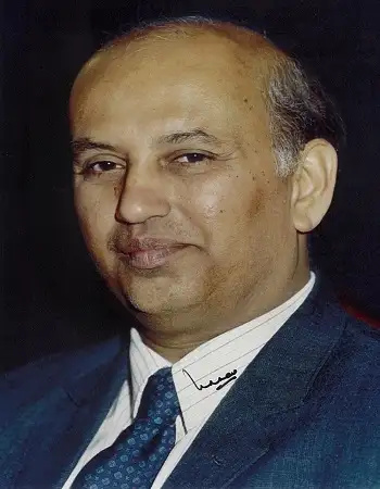 An official portrait of U. R. Rao in a dark suit and tie