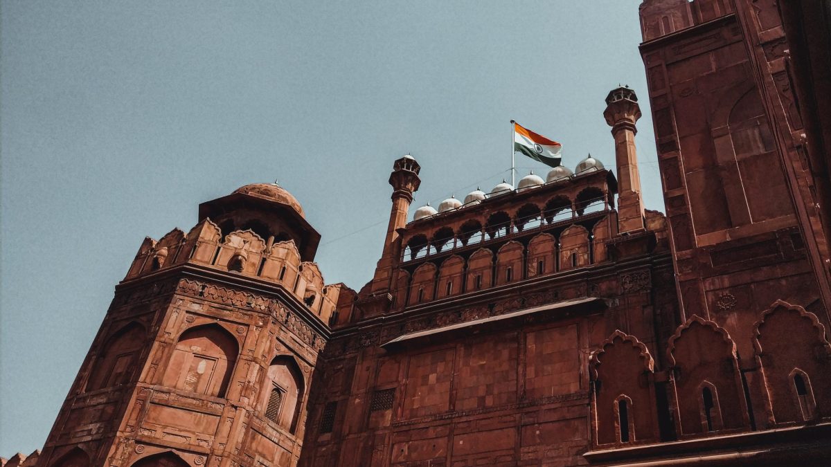 The red sandstone Lahori Gate of the Red Fort in Delhi with the national flag flying above it