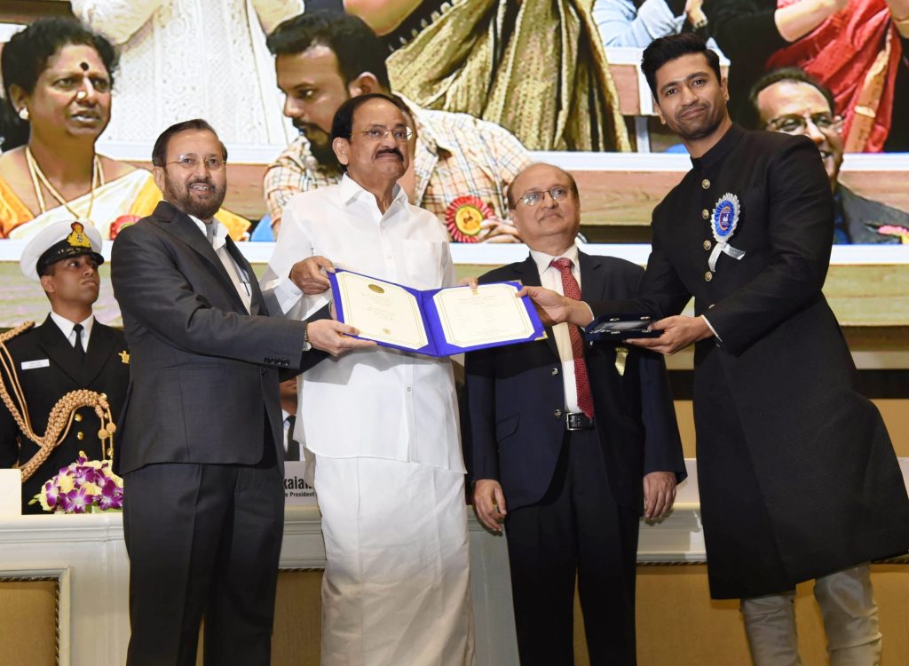 Vicky Kaushal receiving the National Film Award for Best Actor from Vice President Venkaiah Naidu