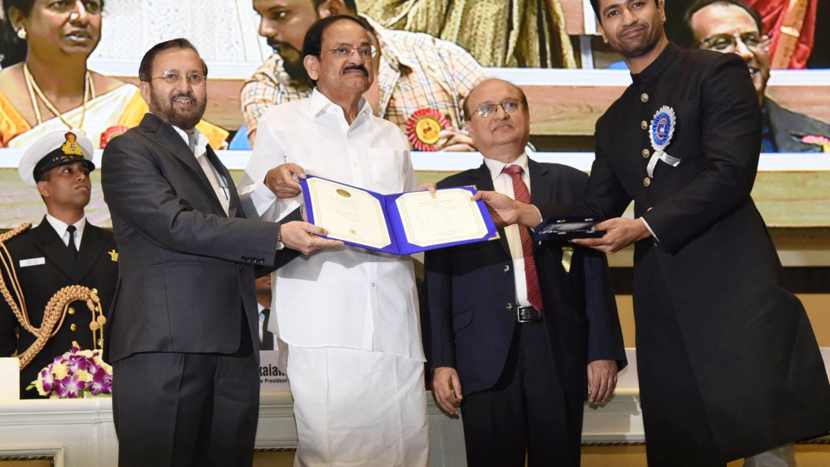 Vicky Kaushal receiving the National Film Award for Best Actor from Vice President Venkaiah Naidu