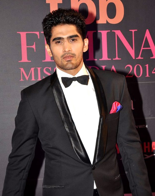 Vijender Singh in a black tuxedo and bow tie