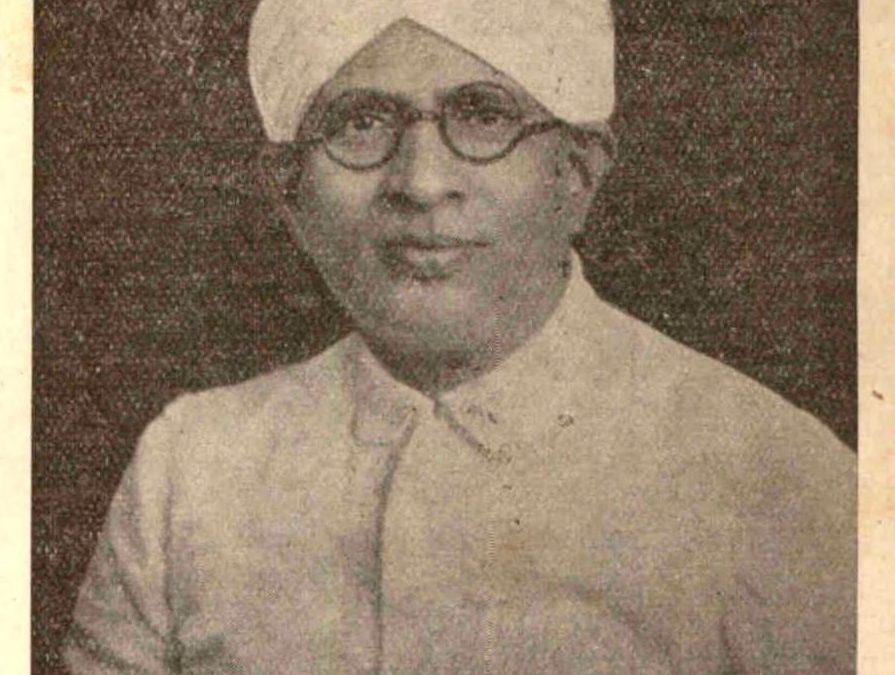 An old portrait of Walchand Hirachand in a turban and glasses